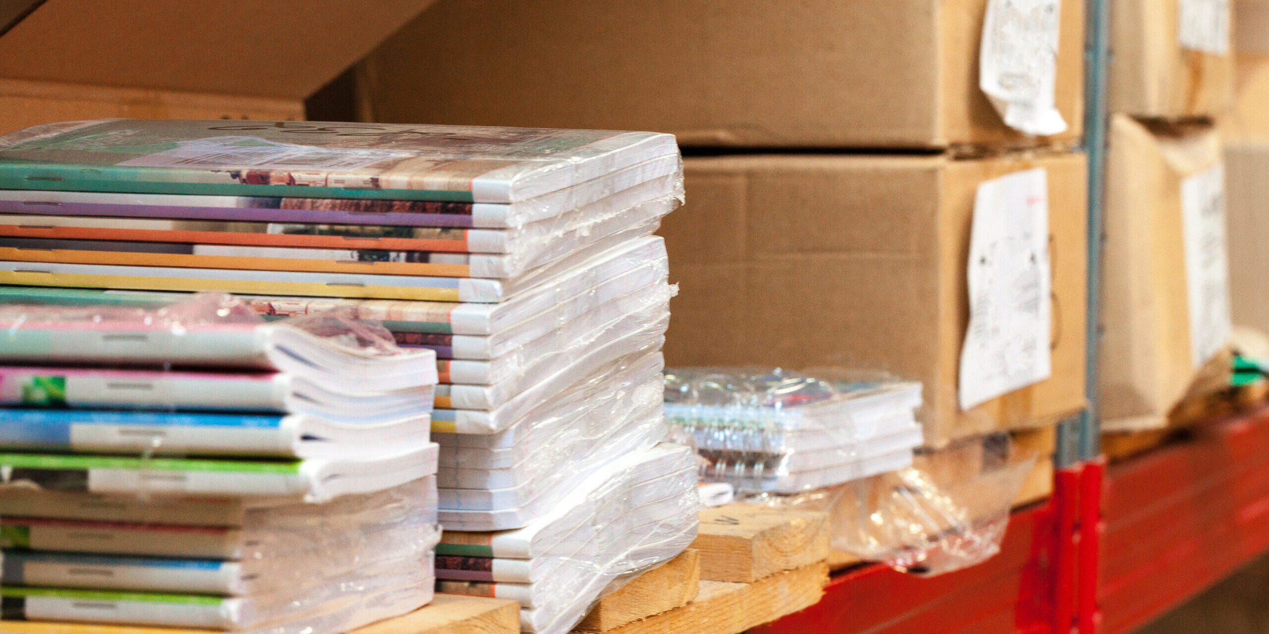 Cardboard sheets pack on a shelf of warehouse
